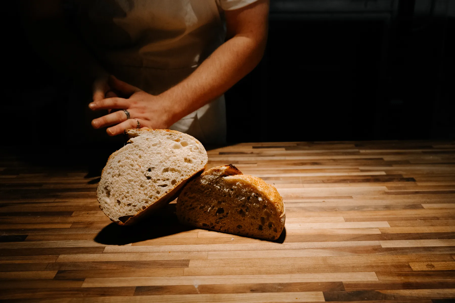 Cozy bakery interior with warm lighting and wooden shelves